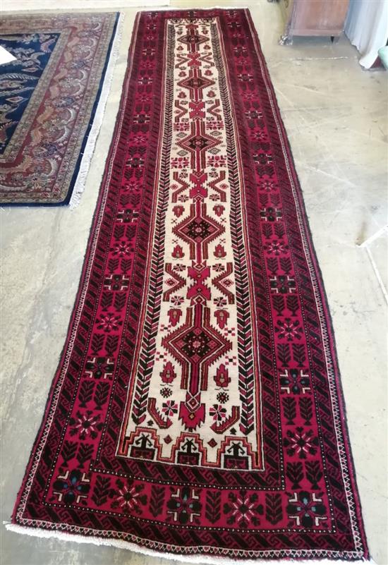 A Belouchi rug, 390 x 96cm